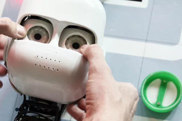 Photo. Epi Robot head on a table.